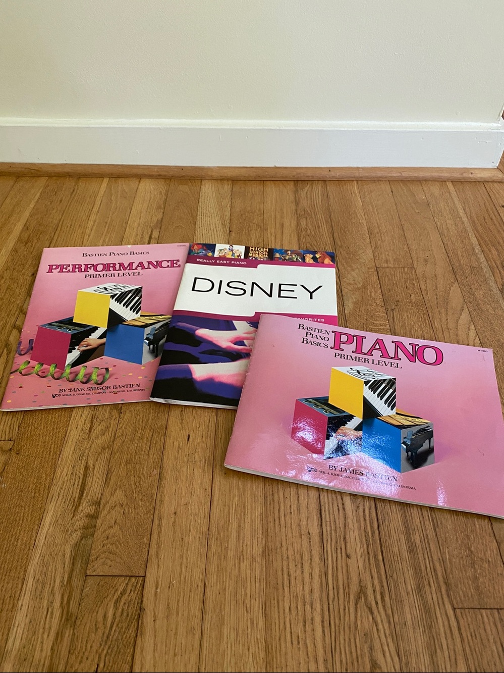 Disney Really Easy Piano 23 Disney Favorites, and two other piano books.
